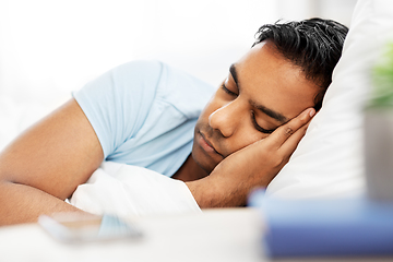 Image showing indian man sleeping in bed at home