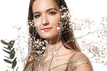 Image showing Close up of beautiful female face with organic treatment over white background. Cosmetics and makeup, natural and eco treatment, skin care.