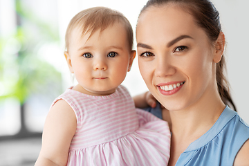 Image showing happy mother with little baby daughter at home