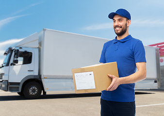 Image showing happy delivery man with parcel box