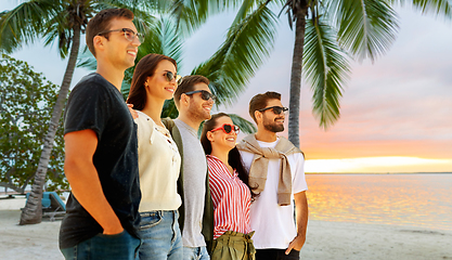 Image showing happy friends on summer beach