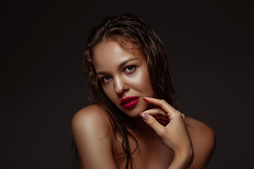 Image showing Portrait of beautiful stylish woman isolated on dark studio background