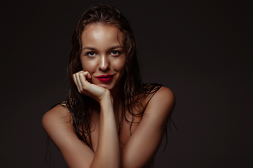 Image showing Portrait of beautiful stylish woman isolated on dark studio background