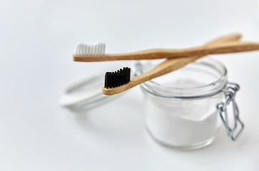 Image showing washing soda and wooden toothbrushes