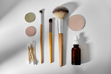 Image showing make up brushes, cosmetics and cotton swabs