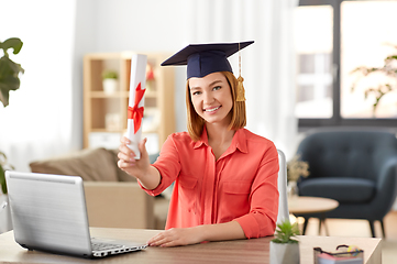 Image showing student woman with laptop and diploma at home
