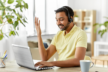Image showing indian man with headset and laptop working at home