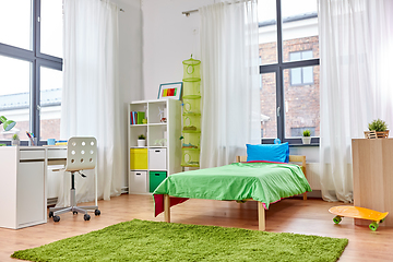 Image showing kid's room interior with bed, table and bookcase