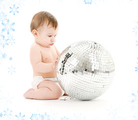 Image showing baby boy with big disco ball