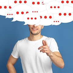 Image showing Man with big speech bubbles on his head like a hairstyle