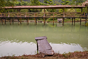 Image showing Wood arbor and walk bridge