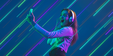 Image showing Neon lighted, colored portrait with neon lines, flyer, proposal