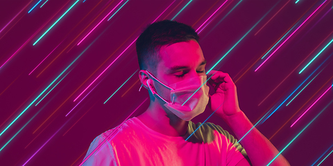 Image showing Neon lighted, colored portrait with neon lines, flyer, proposal