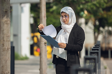 Image showing Beautiful muslim successful businesswoman portrait, confident happy CEO