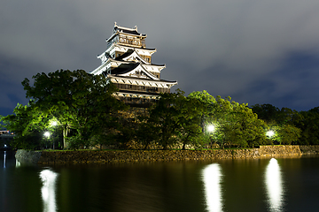 Image showing Hiroshima castle on the side of Otagawa river at night
