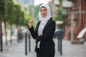 Image showing Beautiful muslim successful businesswoman portrait, confident happy CEO