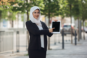 Image showing Beautiful muslim successful businesswoman portrait, confident happy CEO