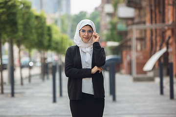 Image showing Beautiful muslim successful businesswoman portrait, confident happy CEO