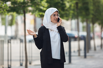 Image showing Beautiful muslim successful businesswoman portrait, confident happy CEO