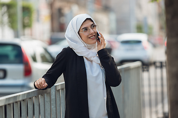 Image showing Beautiful muslim successful businesswoman portrait, confident happy CEO