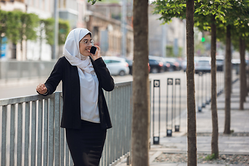 Image showing Beautiful muslim successful businesswoman portrait, confident happy CEO