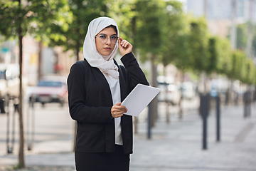 Image showing Beautiful muslim successful businesswoman portrait, confident happy CEO