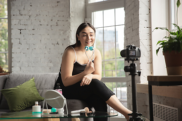 Image showing Caucasian blogger woman make vlog how to be body positive and taking beauty treatment. Lifestyle, influencer women, healthy concept.