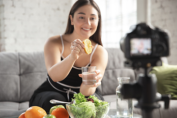 Image showing Caucasian blogger woman make vlog how to diet and lost weight. Lifestyle, influencer women, healthy concept.