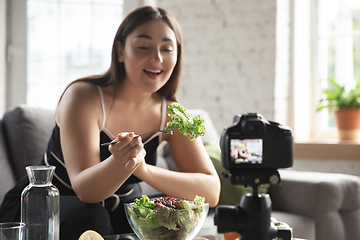 Image showing Caucasian blogger woman make vlog how to diet and lost weight. Lifestyle, influencer women, healthy concept.