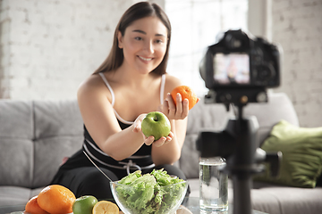 Image showing Caucasian blogger woman make vlog how to diet and lost weight. Lifestyle, influencer women, healthy concept.