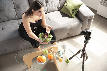 Image showing Caucasian blogger woman make vlog how to diet and lost weight. Lifestyle, influencer women, healthy concept.