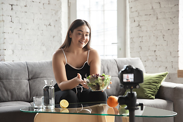 Image showing Caucasian blogger woman make vlog how to diet and lost weight. Lifestyle, influencer women, healthy concept.