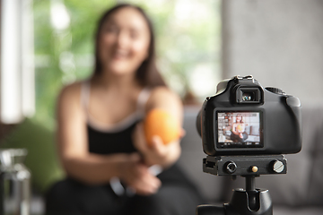 Image showing Caucasian blogger woman make vlog how to diet and lost weight. Lifestyle, influencer women, healthy concept.