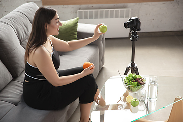 Image showing Caucasian blogger woman make vlog how to diet and lost weight. Lifestyle, influencer women, healthy concept.