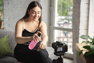 Image showing Caucasian blogger woman make vlog how to be body positive and taking beauty treatment. Lifestyle, influencer women, healthy concept.