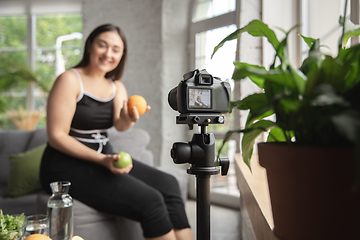 Image showing Caucasian blogger woman make vlog how to diet and lost weight. Lifestyle, influencer women, healthy concept.