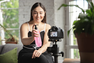 Image showing Caucasian blogger woman make vlog how to be body positive and taking beauty treatment. Lifestyle, influencer women, healthy concept.