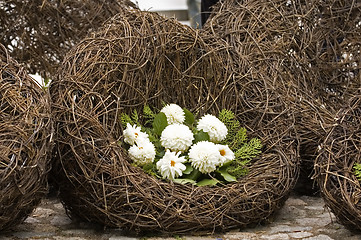 Image showing Decorative of dahlia flowers over cushion