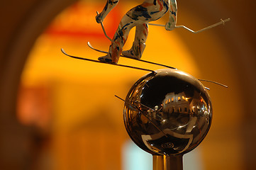 Image showing Skier statue over silver ball