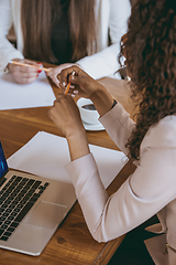 Image showing Business young caucasian woman in modern office with team