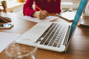 Image showing Business young caucasian woman in modern office with team