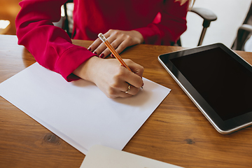 Image showing Business young caucasian woman in modern office with team