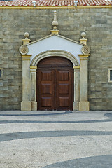 Image showing The front view of a stone house