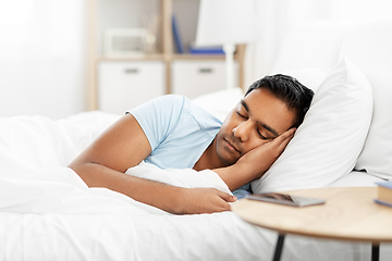 Image showing indian man sleeping in bed at home