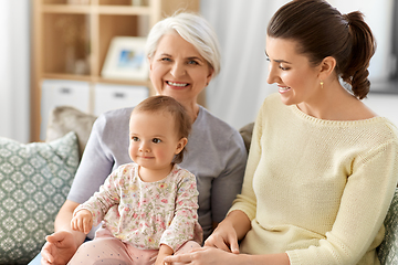 Image showing mother, daughter and grandmother on sofa at home