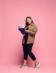 Image showing Young caucasian woman in casual wear. Bodypositive female character. plus size businesswoman