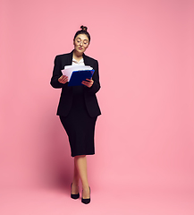 Image showing Young caucasian woman in office attire. Bodypositive female character. plus size businesswoman