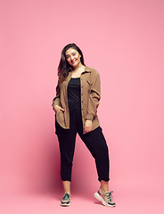 Image showing Young caucasian woman in casual wear. Bodypositive female character. plus size businesswoman