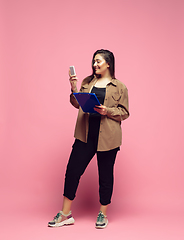 Image showing Young caucasian woman in casual wear. Bodypositive female character. plus size businesswoman