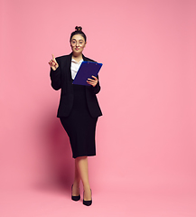 Image showing Young caucasian woman in office attire. Bodypositive female character. plus size businesswoman